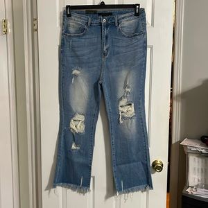 NWT distressed jeans with hole in knee and fringed bottom Boutique Purchased